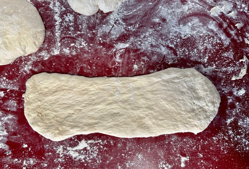 Masa de Barra de pan casero - baguette recién hecho. Receta para barras de pan caseros