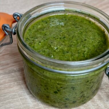 Homemade pesto with walnuts in a pot