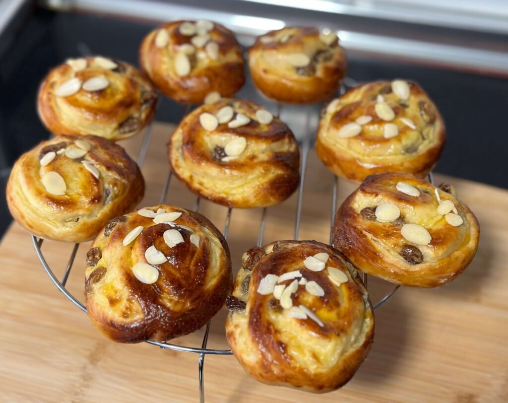 Sweet pastries decorated with sliced almonds