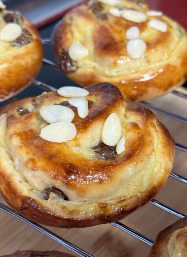 Homemade dutch pastries with pastry cream and raisins