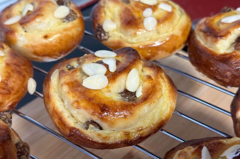 Homemade dutch pastries with pastry cream and raisins