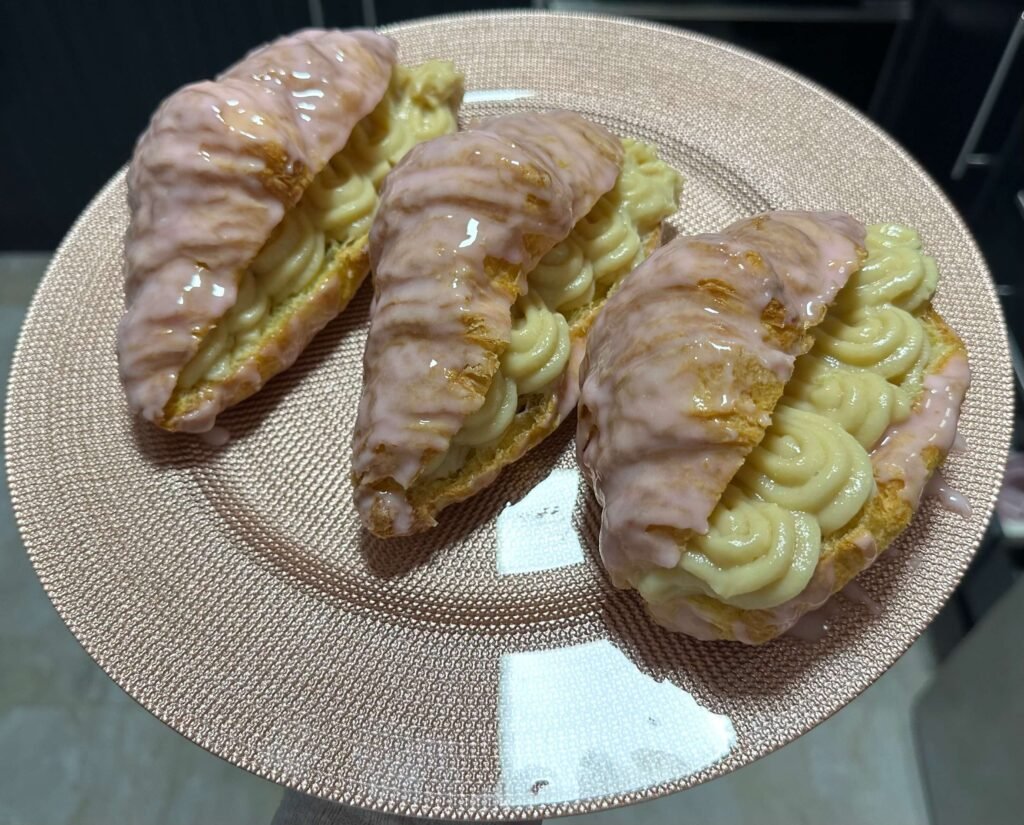 Croissants with pink icing