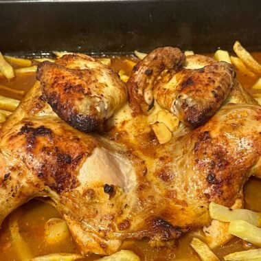 roast chicken with french fries in sauce