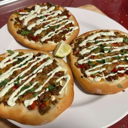 Pizzas With Minced Meat And Homemade Yogurt Sauce