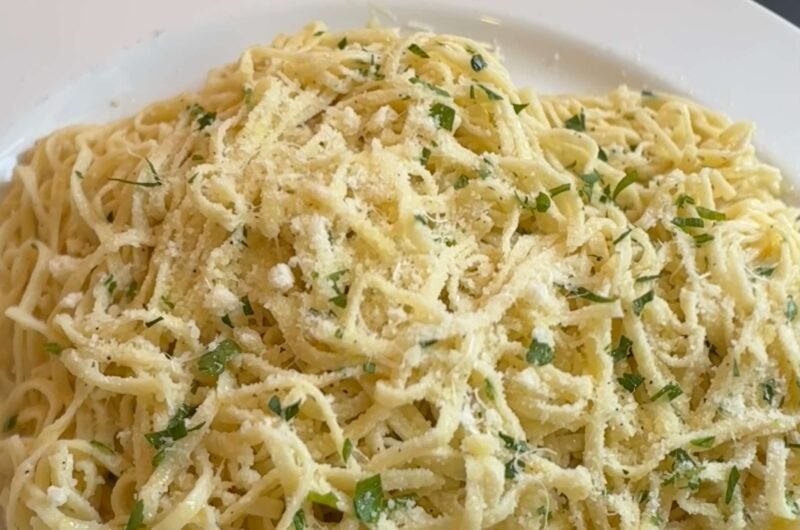 Pasta dish with oil and garlic and Parmigiano Reggiano