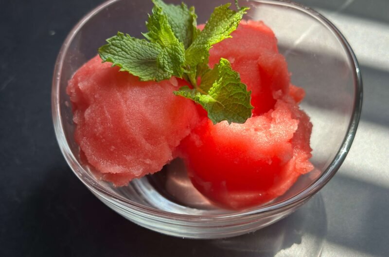 Watermelon ice cream decorated with mint leaves
